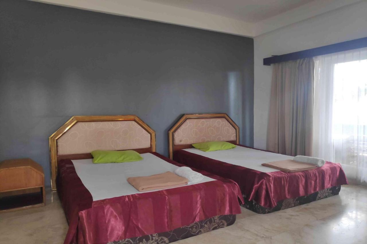 Pecatu Guesthouse Uluwatu Esterno foto